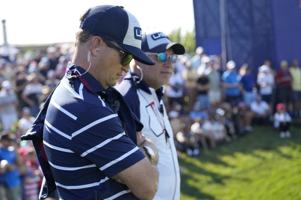 United States' Team Captain Zach Johnson watches his team play on the 12th green during their morning Foursome match at the Ryder Cup golf tournament at the Marco Simone Golf Club in Guidonia Montecelio, Italy, Friday, Sept. 29, 2023. (AP Photo/Andrew Medichini)