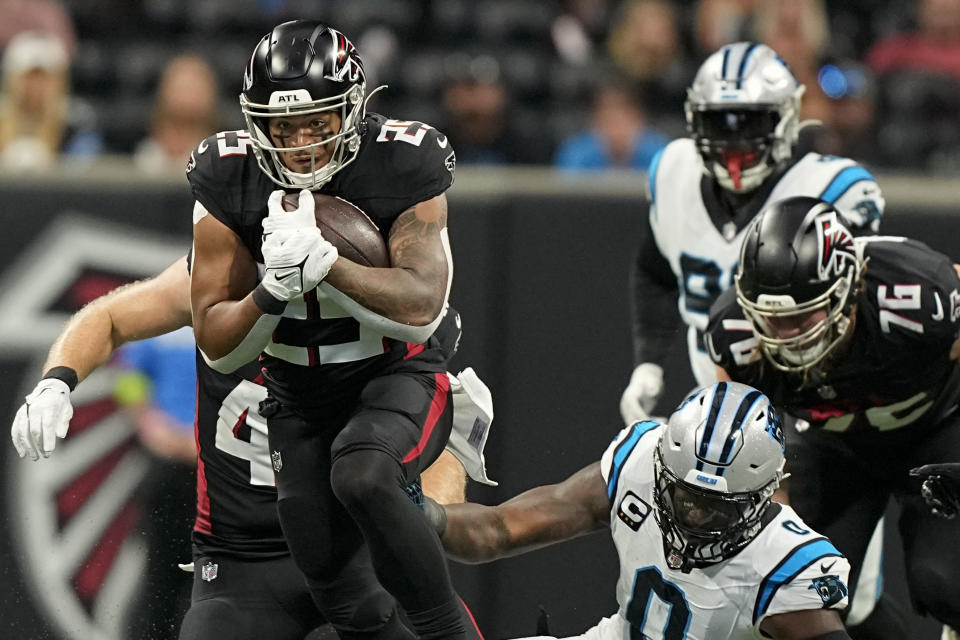 Atlanta Falcons running back Tyler Allgeier (25) runs against the Carolina Panthers during the first half of an NFL football game, Sunday, Sept. 10, 2023, in Atlanta. (AP Photo/Brynn Anderson)