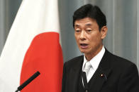 FILE - Then Economic revitalization minister, Yasutoshi Nishimura speaks during a press conference in Tokyo Wednesday, Sept. 11, 2019. Nishimura told reporters Tuesday, Dec. 6, 2022, that the new company, Rapidus, which was launched last month by eight corporate giants including automakers, electronics and chipmakers, will team up with the Imec, a Leuven, Belgium-based research organization known for the nanoelectronics and digital technologies key to developing next-generation chips. (AP Photo/Eugene Hoshiko, File)