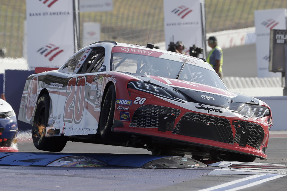 Christopher Bell (20) navigates Turn 12 during the NASCAR Xfinity Series auto race at Charlotte Motor Speedway in Concord, N.C., Saturday, Sept. 28, 2019. (AP Photo/Gerry Broome)