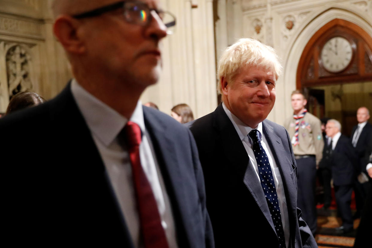 Britain's Prime Minister Boris Johnson and opposition Labour Party Leader Jeremy Corbyn walk through the Commons Members Lobby in Parliament, London, Britain, October 14, 2019. Tolga Akmen/Pool via REUTERS