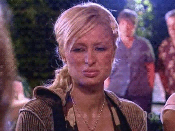 Paris Hilton making a cringed-out, gross face