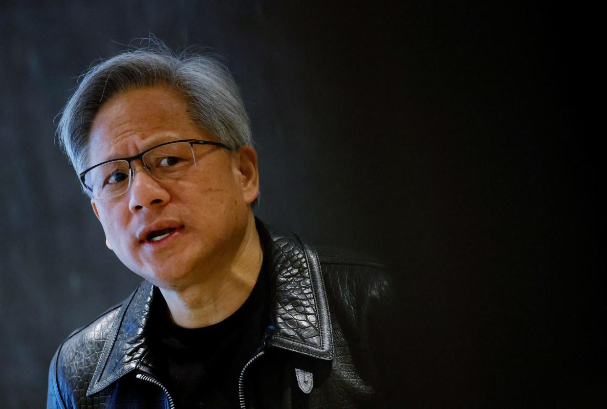 NVIDIA's CEO Jensen Huang attends a media roundtable meeting in Singapore December 6, 2023.