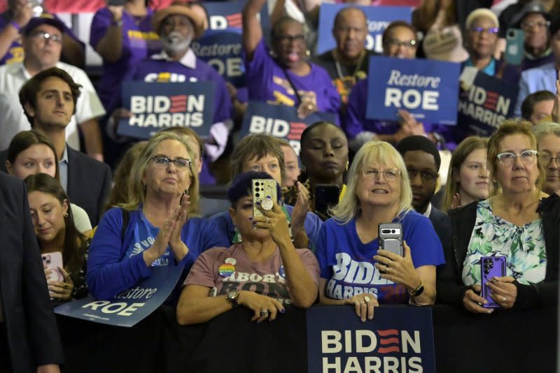 Biden supporters attend a campaign rally Tuesday at Hillsborough Community College in Florida where President Joe Biden blasted former President Donald Trump over reproductive rights. Photo by Steve Nesius/UPI