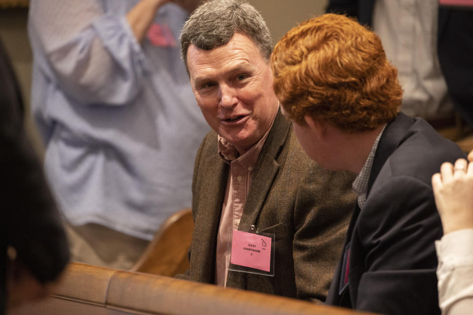 Randy Murdaugh talks with his nephew Buster Murdaugh during the double murder trial of Alex Murdaugh at the Colleton County Courthouse in Walterboro, S.C., Thursday, Feb. 2, 2023. (Andrew J. Whitaker/The Post And Courier via AP, Pool)