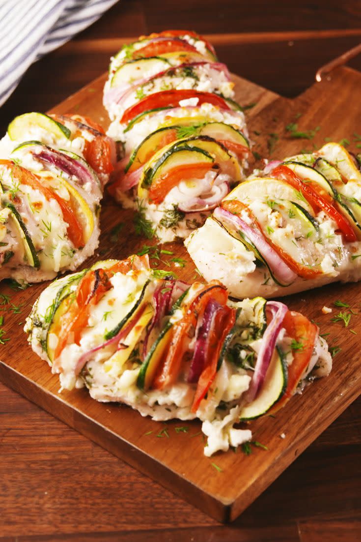 <p>You'll Greek out over this.</p><p>Get the recipe from <a href="https://www.delish.com/cooking/recipe-ideas/recipes/a57364/greek-stuffed-chicken-recipe/" rel="nofollow noopener" target="_blank" data-ylk="slk:Delish;elm:context_link;itc:0;sec:content-canvas" class="link ">Delish</a>. </p>