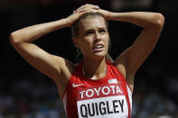 FILE - United States' Colleen Quigley looks at her time from heat two of the women's 3000m steeplechase at the World Athletics Championships at the Bird's Nest stadium in Beijing, in this Monday, Aug. 24, 2015, file photo. Quigley left Nike after what they've described as discriminatory or insulting business practices. "Nike was trying to offer me less than what they offered me when I came out of college,” Quigley said in a recent podcast. “To me, it was just a slap in the face.” (AP Photo/David J. Phillip)