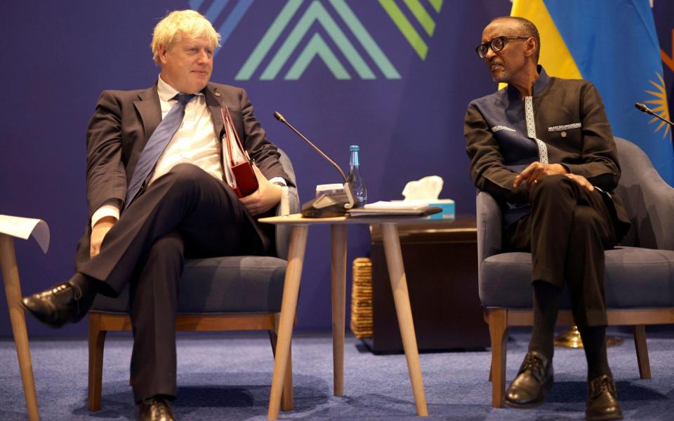 Boris Johnson and Paul Kagame on the sidelines of the Chogm heads of government meeting - Dan Kitwood/Getty