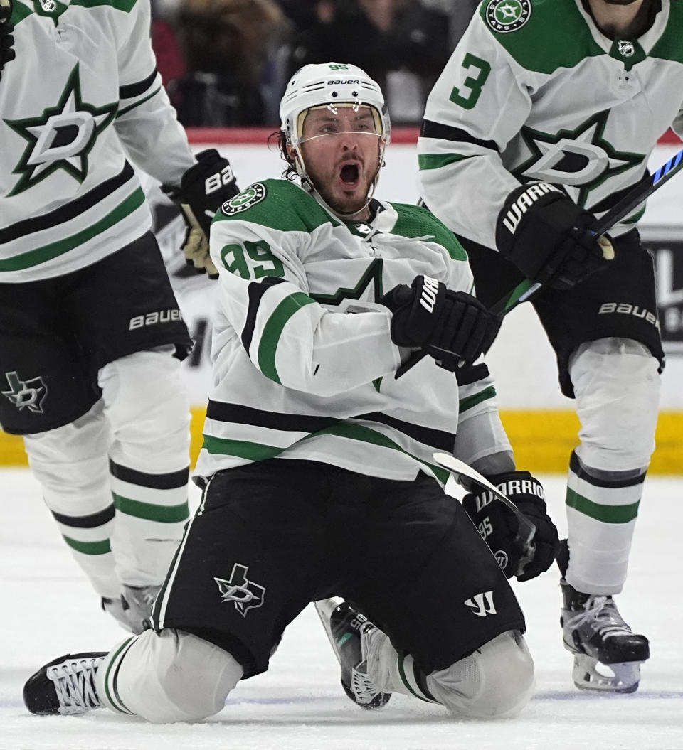 Dallas Stars center Matt Duchene celebrates after scoring the winning goal in the second overtime of Game 6 of an NHL hockey playoff series against the Colorado Avalanche Friday, May 17, 2024, in Denver. (AP Photo/David Zalubowski)