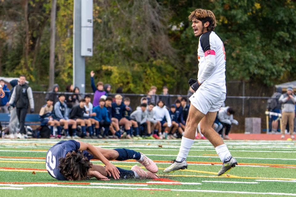 Dover #4 John Munoz celebrates on the field. Old Tappan hosts Dover in the North 1, Group 3 boys soccer semifinals on Wednesday, November 1, 2023.