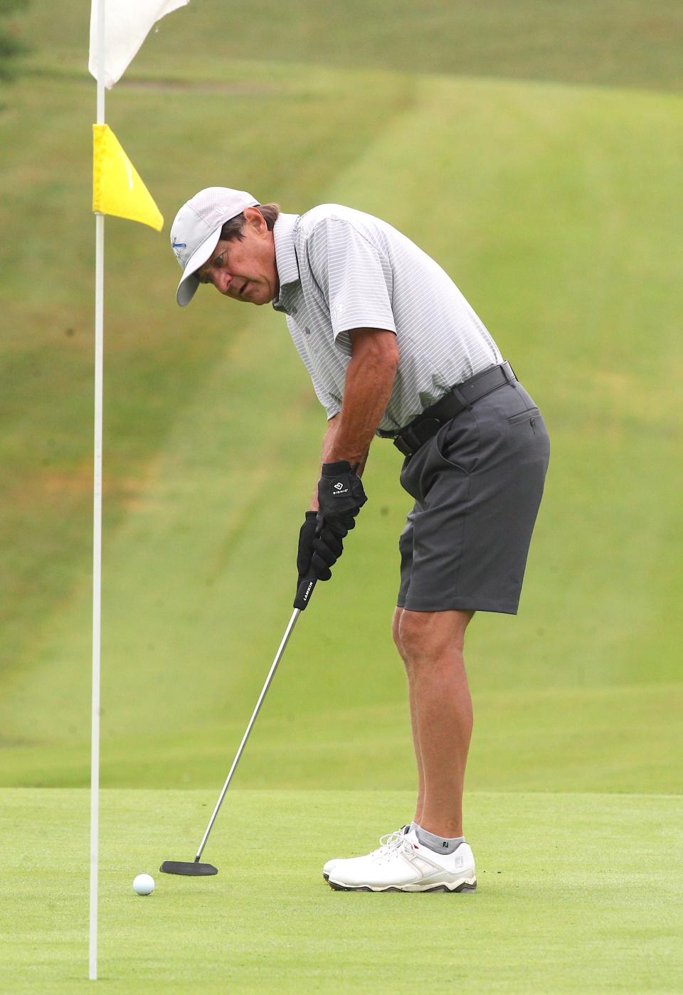 Gary EuDaly putts on No. 1at Cascades Golf Course to start his day in the City Golf Qualifying Tournament on Sunday, June 26, 2022. EuDaly won the Senior title with a 73-71—144.