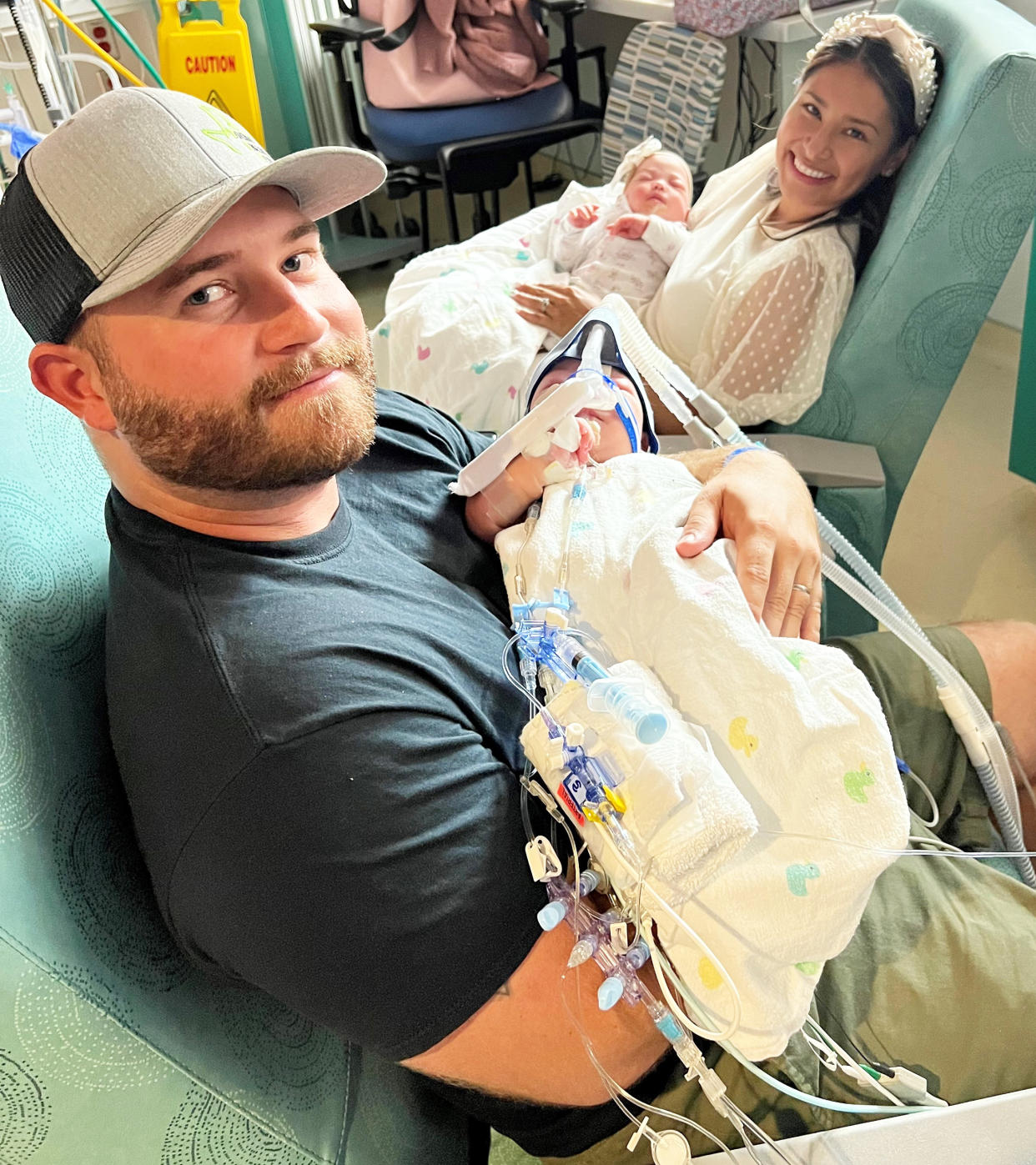 Holding their babies separately for the first time felt exciting for Jesse and Sandy Fuller. (Courtesy Texas Children's Hospital )