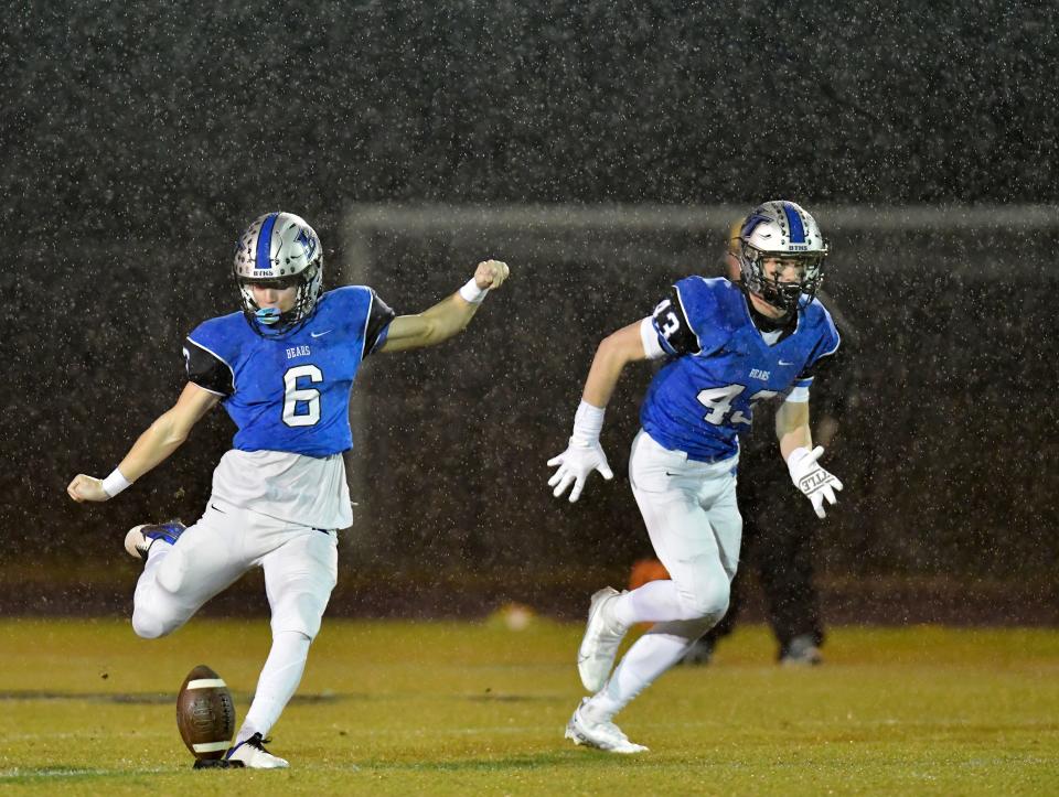Bartram Trail's Liam Padron( 6) with teammate Michael Matos (43) on the opening kickoff in the rain in their game against Buchholz Friday night. The Bartram Trail Bears football team hosted Gainesville's Buchholz Bobcats at the Bears Saint Johns stadium Friday, November 25, 2022. With the Buchholz's Friday night 21 to 20 win in the FHSAA Region 1-4S high school football final, the Bobcats's advance to the final four.