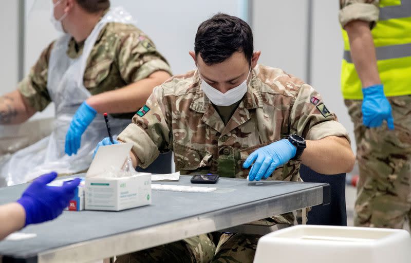 FILE PHOTO: Mass Covid testing in Liverpool under the first trial of whole city testing in England