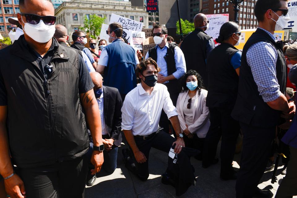 Canadian Prime Minister Justin Trudeau took a knee during an anti-racism protest on Parliament Hill in Ottawa. (ASSOCIATED PRESS)