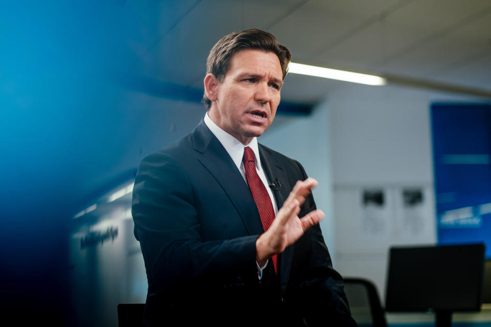 Ron DeSantis speaks with reporters during an interview in Des Moines, Iowa. (Jamie Kelter Davis for NBC News)