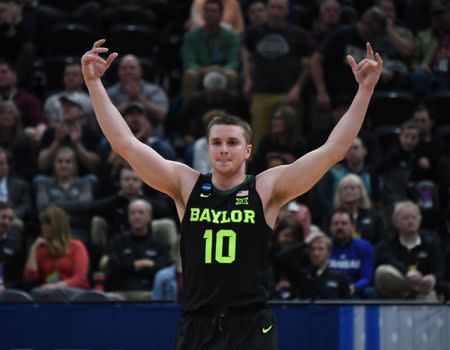 Mar 21, 2019; Salt Lake City, UT, USA; Baylor Bears guard Makai Mason (10) celebrates after defeating the Syracuse Orange in the first round of the 2019 NCAA Tournament at Vivint Smart Home Arena. Mandatory Credit: Kirby Lee-USA TODAY Sports