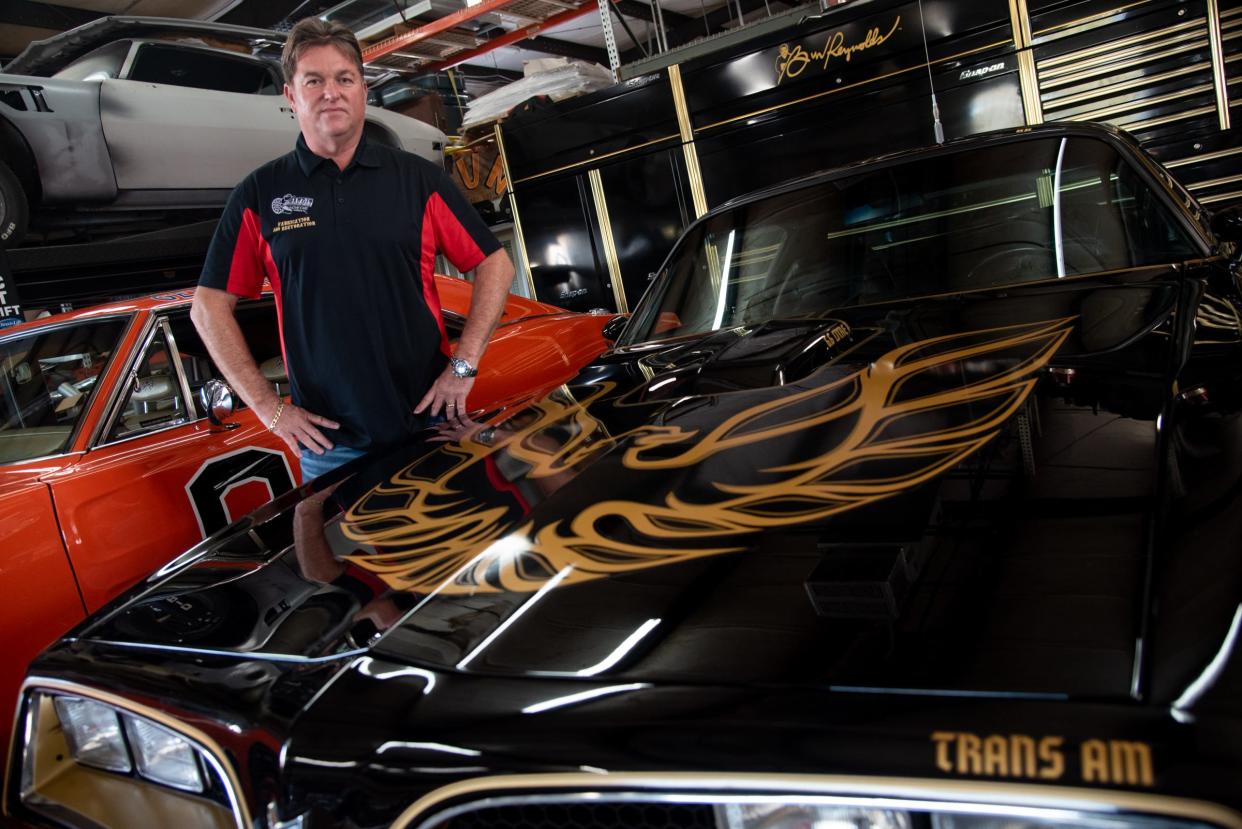 Gene Kennedy, pictured with the last car his dear friend Burt Reynolds ever owned, a 1977 Pontiac Trans Am. It is identical to the one the movie star drove in Smokey and the Bandit.