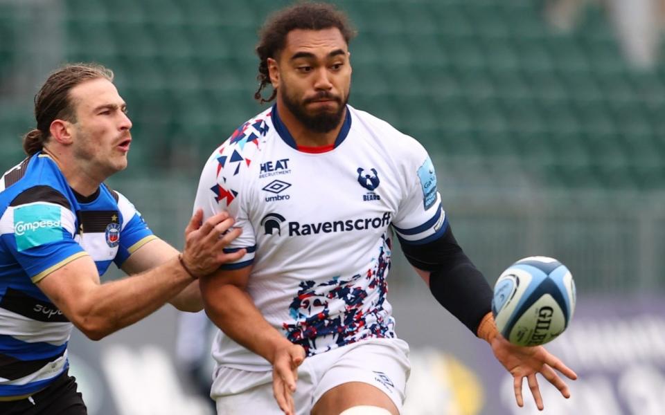 Chris Vui of Bristol feeds a pass as Max Clark of Bristol closes in during the Gallagher Premiership Rugby match between Bath and Bristol at The Recreation Ground on May 08, 2021 in Bath, England. Sporting stadiums around the UK remain under strict restrictions due to the Coronavirus Pandemic as Government social distancing laws prohibit fans inside venues resulting in games being played behind closed doors