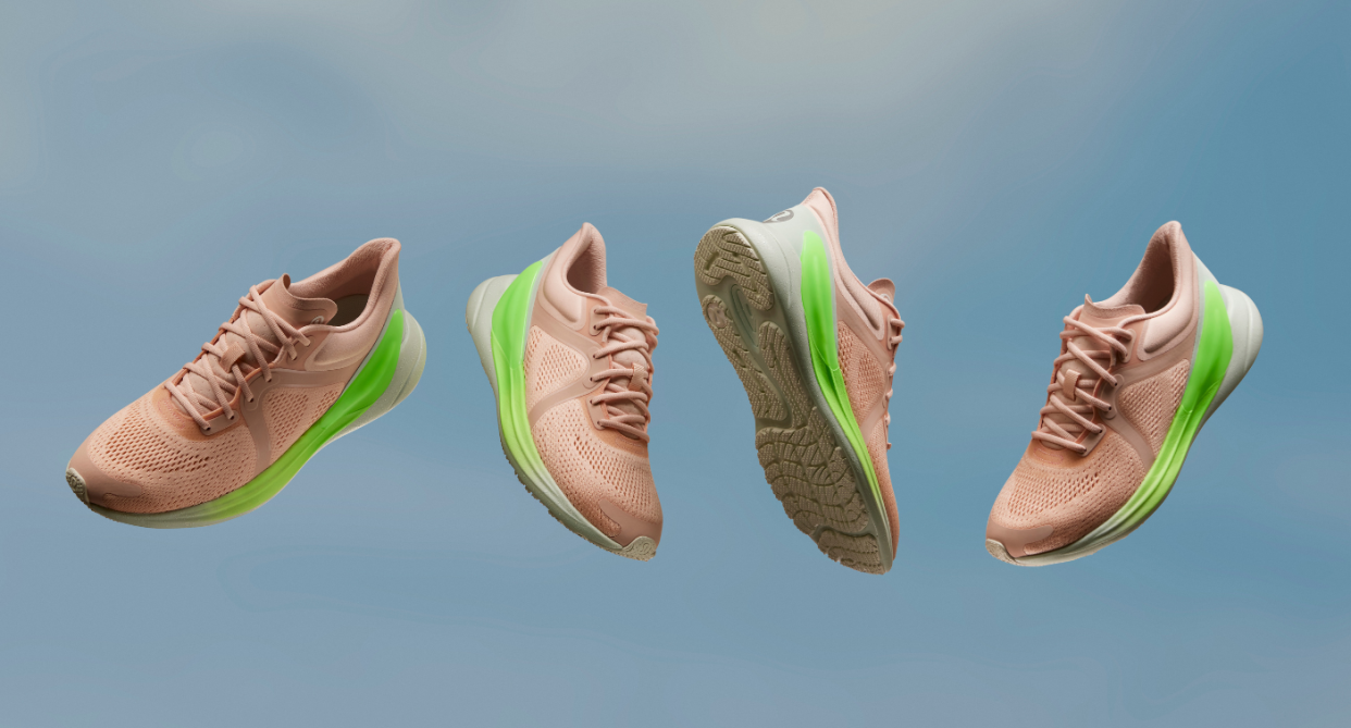 four pink and neon green sneakers floating in blue sky background, Lululemon