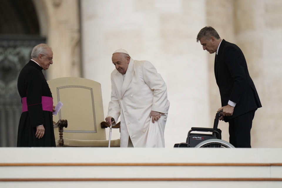 Pope Francis leaves the altar at the end of his weekly general audience in St. Peter's Square, at the Vatican, Wednesday, April 3, 2024. (AP Photo/Alessandra Tarantino)