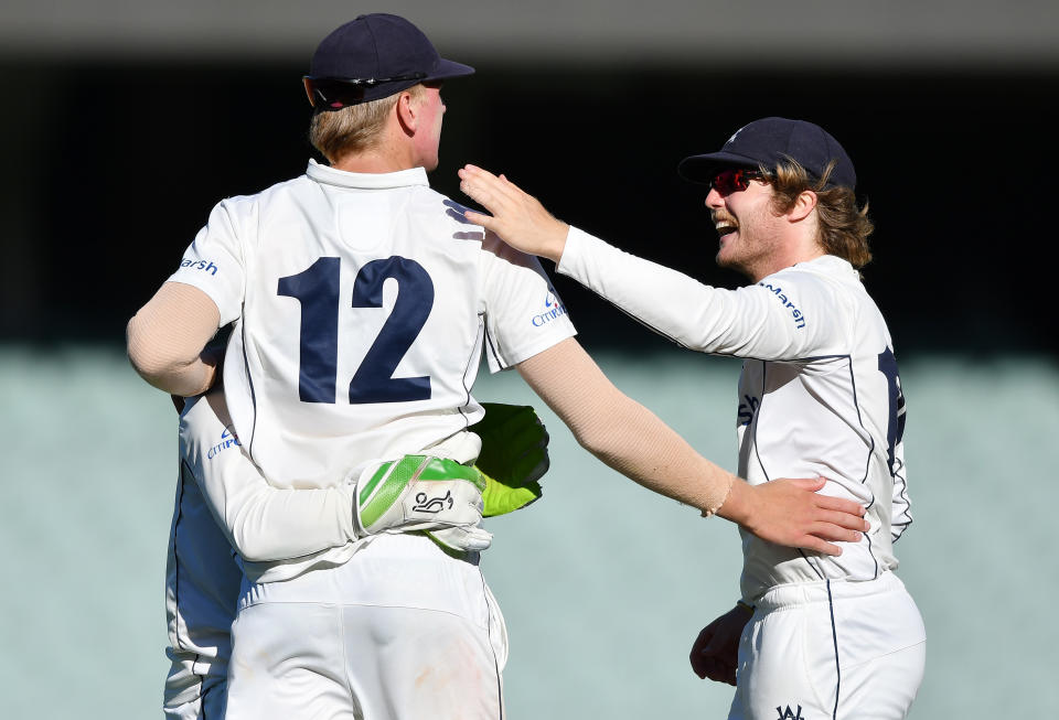 Will Sutherland and Will Pucovski, pictured here celebrating a wicket for Victoria against South Australia.