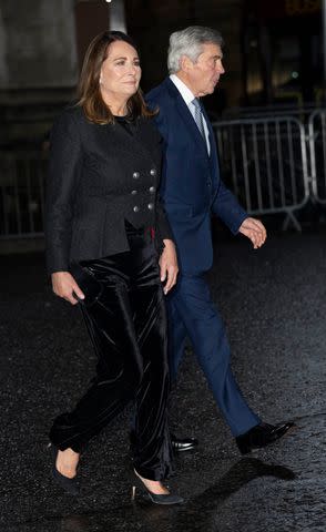 <p>Mark Cuthbert/UK Press via Getty</p> Carole and Michael Middleton arrive at Westminster Abbey for the Together At Christmas carol concert on December 8.