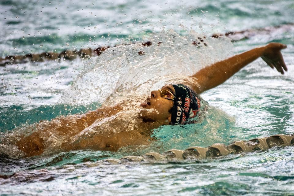 Raaghav Reddy of Mendham competes in the 100-yard backstroke during the Morris County Boys Swimming Championships at Morris County Community College on Saturday Jan. 22, 2022.