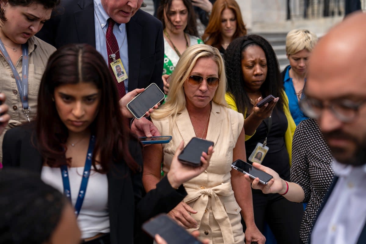 WASHINGTON, DC - APRIL 30: Rep. Marjorie Taylor Greene (R-GA) is surrounded by members of the media as she departs the U.S. Capitol building on April 30, 2024 in Washington, DC. After speaking with House Majority Leader Steve Scalise (R-LA) and the House Parliamentarian, Greene told reporters that her plan to oust Speaker Johnson "is still being developed" after signaling earlier in the day she was ready to move forward with it. (Photo by Kent Nishimura/Getty Images) (Getty Images)