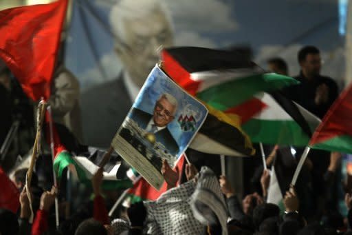 Palestinians celebrate in the West Bank city of Ramallah on November 29. The UN General Assembly has overwhelmingly voted to make Palestine a non-member state, inflicting a major diplomatic defeat on the United States and Israel