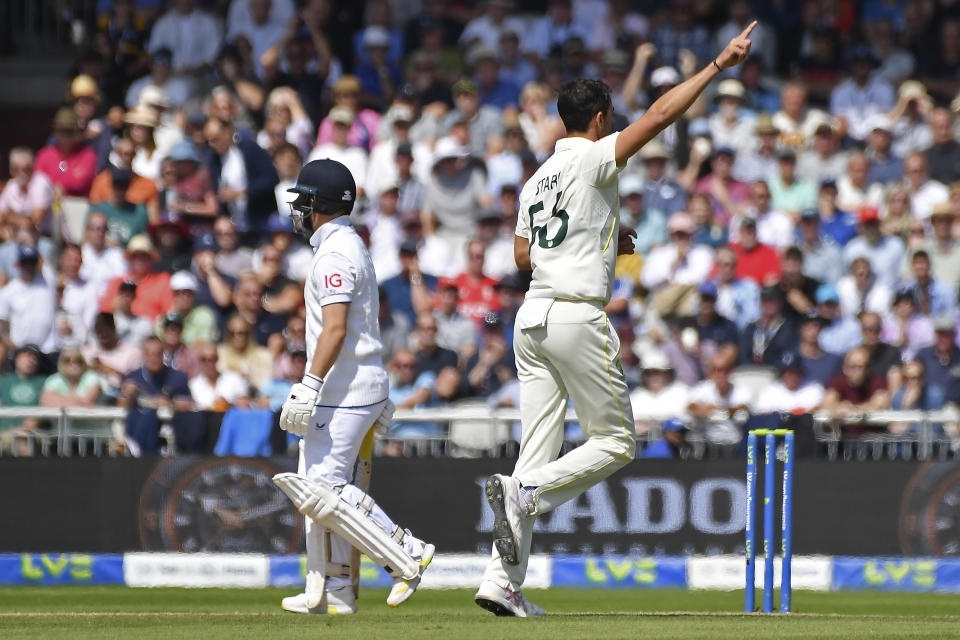 Australia's Mitchell Starc, right, celebrates the dismissal of England's Ben Duckett during the second day of the fourth Ashes cricket Test match between England and Australia at Old Trafford in Manchester, England, Thursday, July 20, 2023. (AP Photo/Rui Vieira)