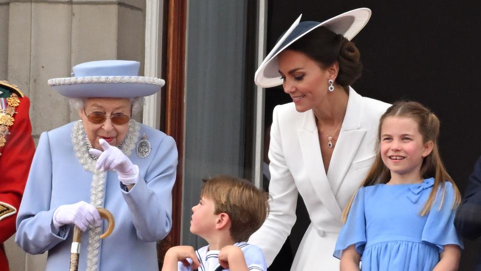 Queen Elizabeth II, Prince Louis, Princess Kate and Princess Charlotte during Trooping the Colour in June 2022