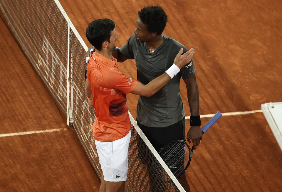 Novak Djokovic, pictured here embracing Gael Monfils after their clash at the Madrid Open.