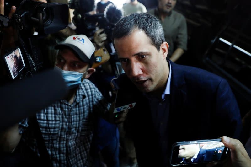 Venezuela's opposition leader Juan Guaido speaks to the media, in Caracas