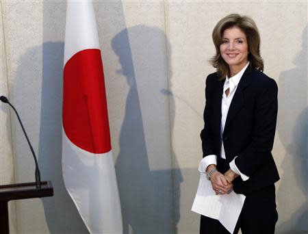 Newly appointed U.S. ambassador to Japan Caroline Kennedy smiles before she gives a statement upon her arrival in Japan at Narita International Airport in Narita, suburban Tokyo November 15, 2013. REUTERS/Koji Sasahara/Pool