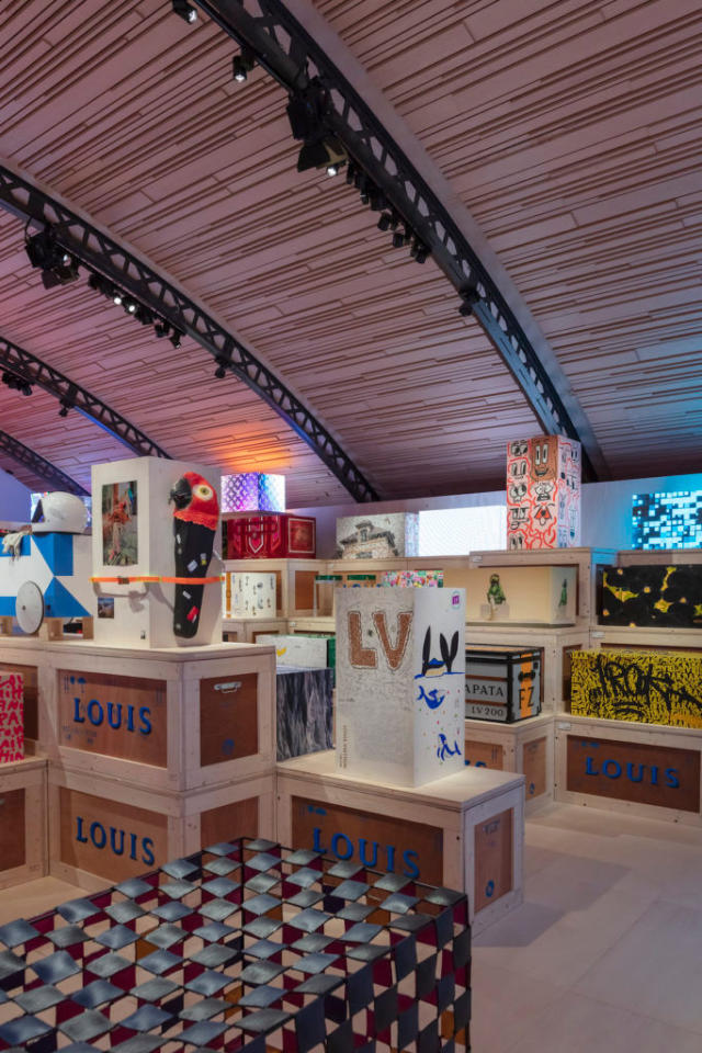 Visitors arrive at the Louis Vuitton's 200 Trunks, 200 Visionaries