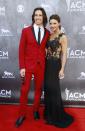 Country music artist Jake Owen and his wife Lacey Buchanan Owen arrive at the 49th Annual Academy of Country Music Awards in Las Vegas, Nevada April 6, 2014. REUTERS/Steve Marcus (UNITED STATES - Tags: ENTERTAINMENT) (ACMAWARDS-ARRIVALS)
