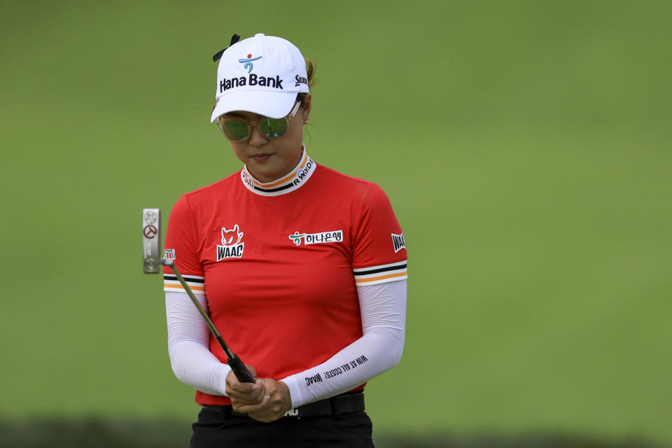 Minjee Lee, of Australia, lines up a putt on the fourth green during the second round of the LPGA Tour Kroger Queen City Championship golf tournament in Cincinnati, Friday, Sept. 9, 2022. (AP Photo/Aaron Doster)