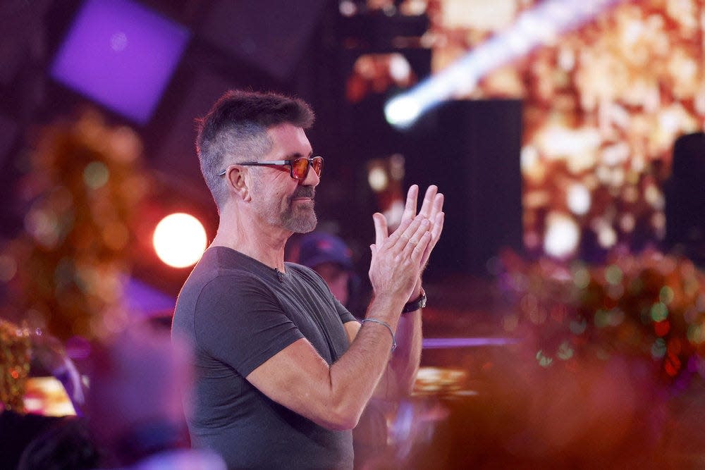 "America's Got Talent" judge Simon Cowell applauds during the first quarterfinal round of Season 19, Aug. 13, 2024.