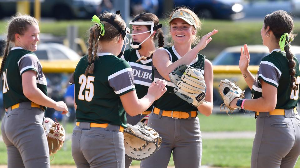 Members of the Audubon High School softball team huddle together during the softball game between Audubon and Gloucester played in Gloucester City on Tuesday, May 7, 2024.