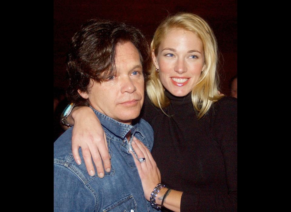 After 20 years together, rockstar John Mellencamp and his model wife, Elaine Irwin Mellencamp, announced that they were <a href="http://www.huffingtonpost.com/2010/12/31/john-mellencamp-wife-elai_n_802997.html" target="_hplink">separating in December 2010</a>.     At the time of the announcement, Mellencamp's publicist said the couple were "proud of their 20 years together and are very happy with their accomplishments both as parents and as a family."    The pair, who have two sons, officially <a href="http://www.people.com/people/article/0,,20518322,00.html" target="_hplink">finalized their divorce</a> in August 2011. 