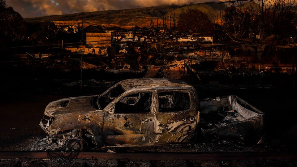 The remains of a vehicle in a burned neighborhood after wildfires in Lahaina in Maui, Hawaii, on August 18. - Bryan Anselm/New Jersey State Council for the Arts Fellowship/Redux