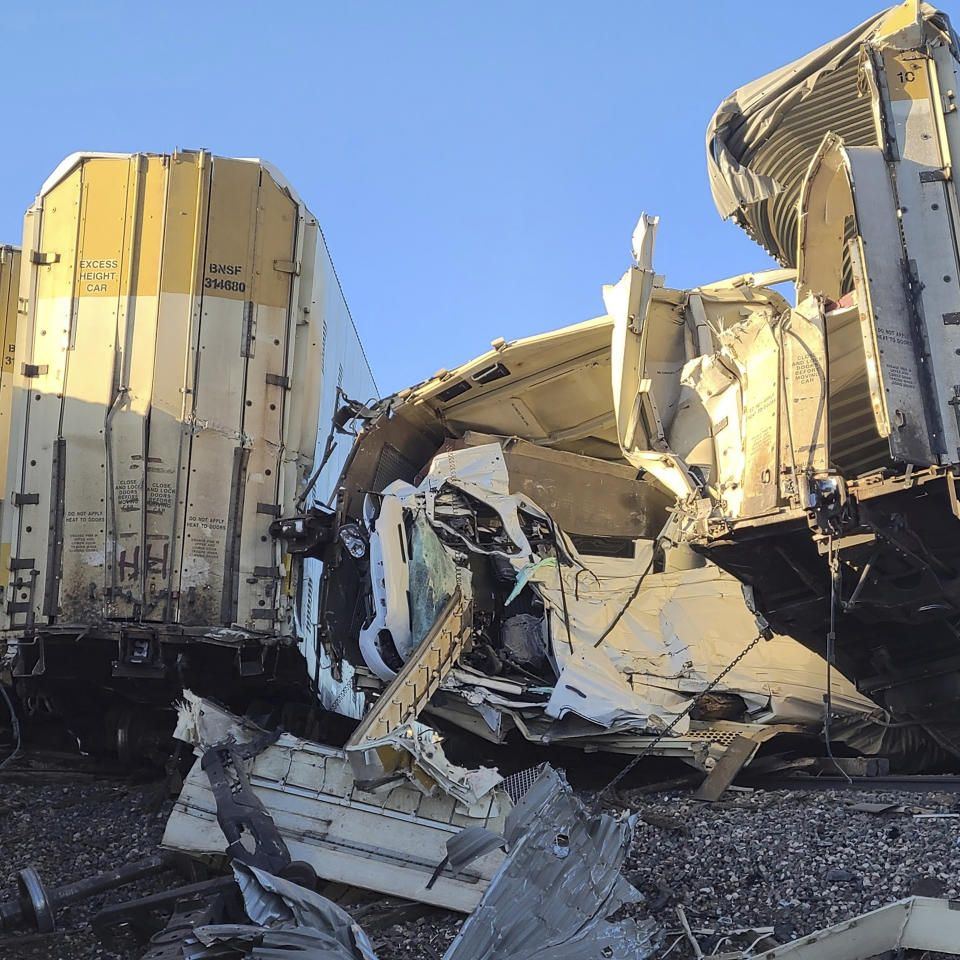 This image provided by the Coconino County Emergency Management shows damages caused by a freight train derailment, Wednesday, June 7, 2023 east of Williams, Ariz. (Coconino County Emergency Management via AP)