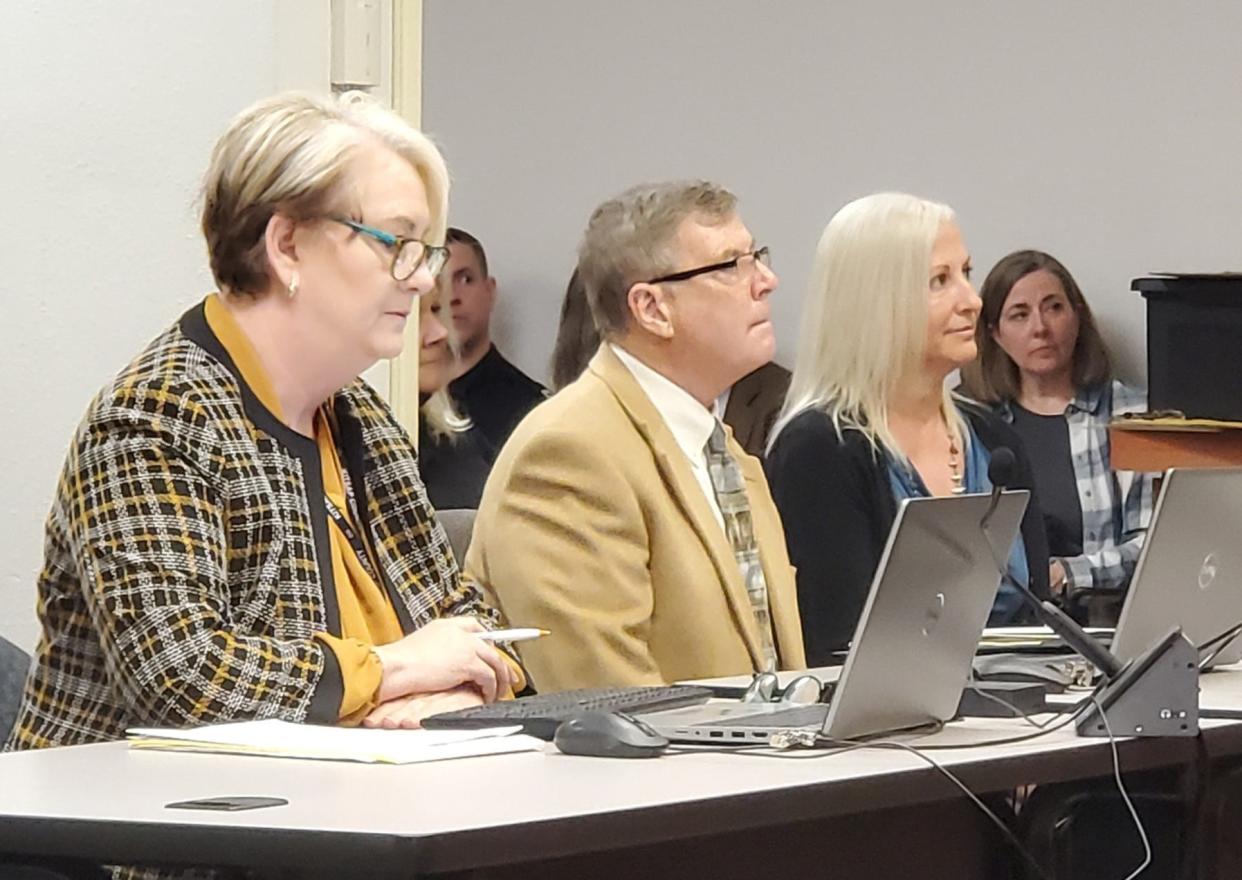 North Kitsap School District Superintendent Laurynn Evans (right) appeared in Kitsap County District Court on Wednesday to face a misdemeanor charge of removing/defacing political advertising.