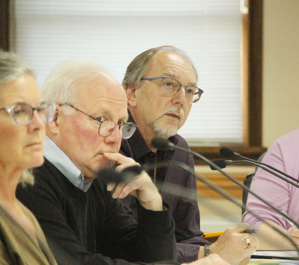 Alderman Mike Barr asks a question regarding the GLCEDC during Monday's Pontiac City Council meeting. Listening are Alderperson Kelly Eckhoff, left, and Alderman Frank Giovanini.