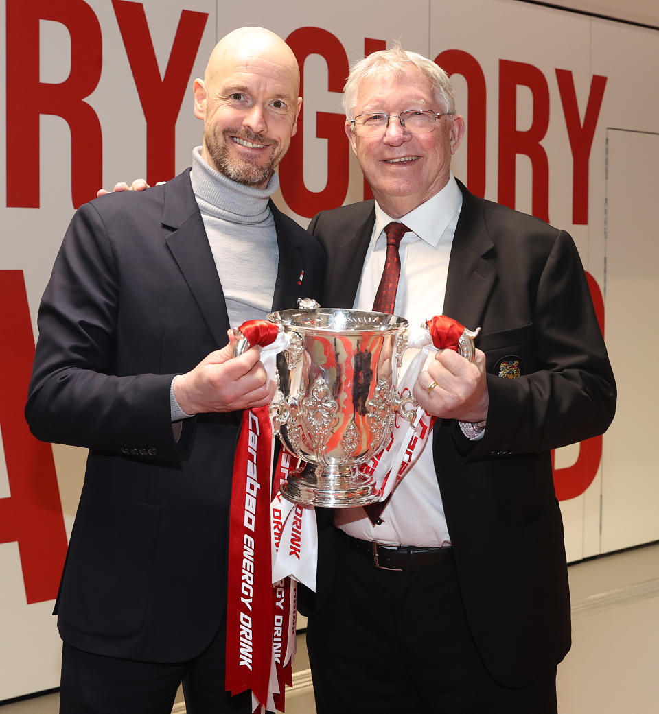 Manchester United manager Erik ten Hag (left) with former United boss Alex Ferguson after winning the Carabao Cup. 