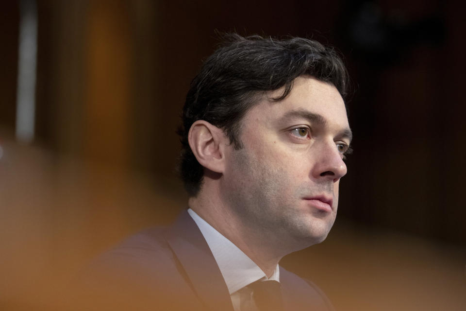 FILE - Sen. Jon Ossoff, D-Ga., listens during a Senate Intelligence Committee hearing to examine worldwide threats at the Capitol in Washington, Wednesday, March 8, 2023. Ossoff sharply questioned Assistant Attorney General Matt Olsen in June about how it searches Section 702 of the Foreign Intelligence Surveillance Act data and signaled he would push for new protections. “I don't think you've effectively made the case that there shouldn't be a warrant requirement, whether or not it is constitutionally required, for a U.S. person search that is crime only,” he said. (AP Photo/Amanda Andrade-Rhoades, File)