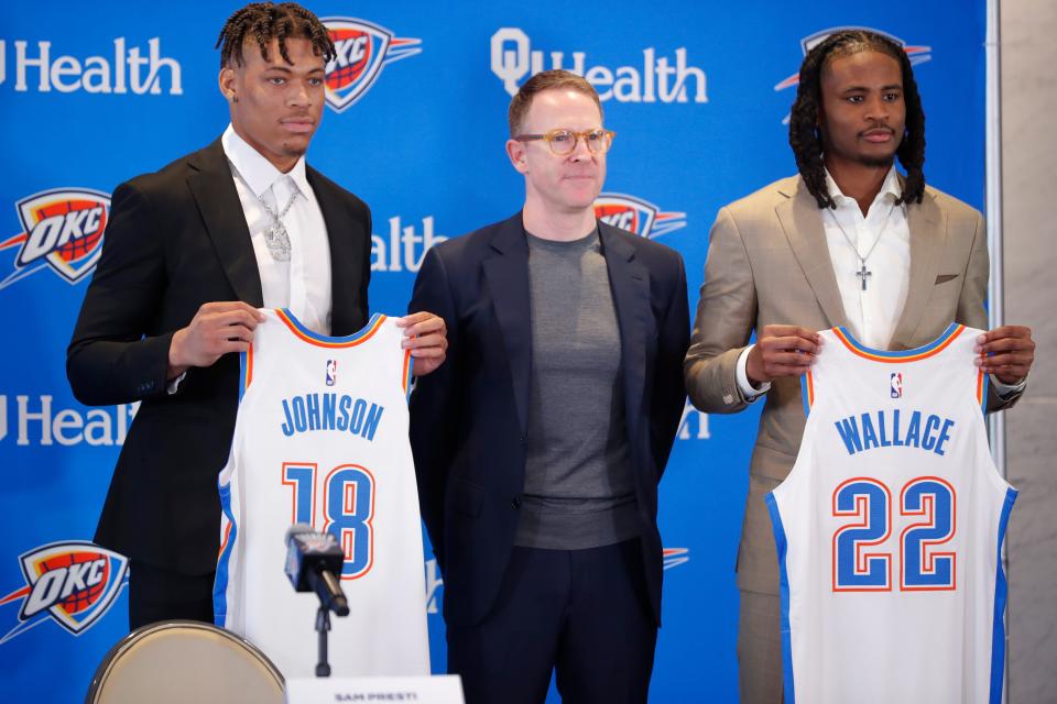 Oklahoma City general manager Sam Presti poses for a photo with Thunder draft picks Keyontae Johnson, left and Cason Wallace during a Thunder press conference in Oklahoma City, Saturday, June 24, 2023. The Thunder selected Wallace as the No. 10 overall pick and Johnson as the No. 50 overall pick in the 2023 NBA Draft.