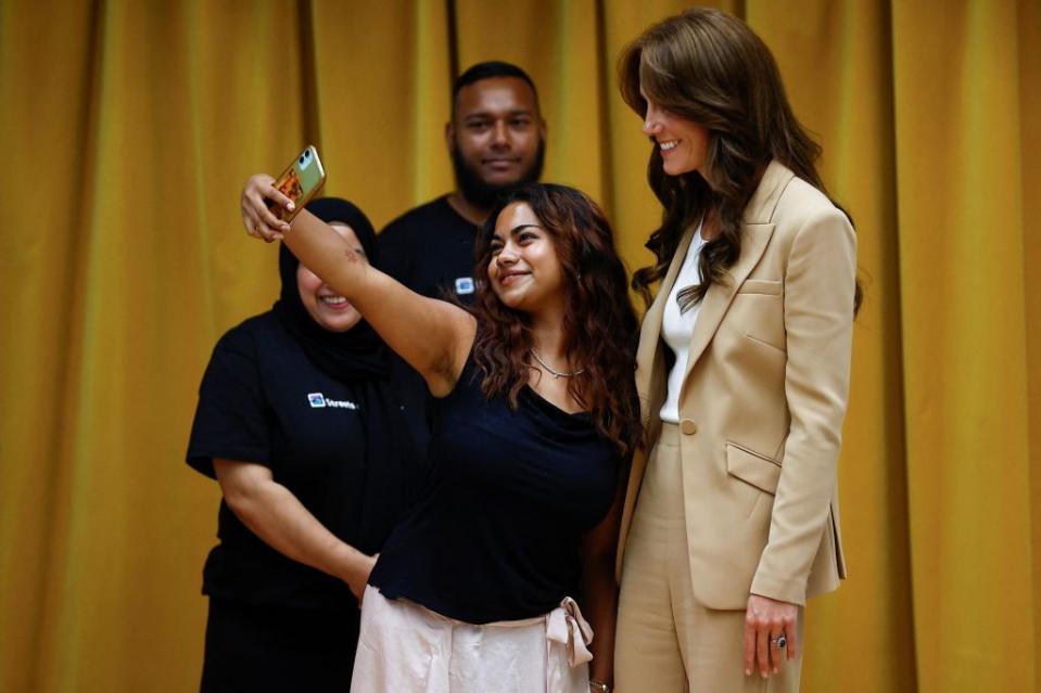 kate middleton taking a selfie with fans in london