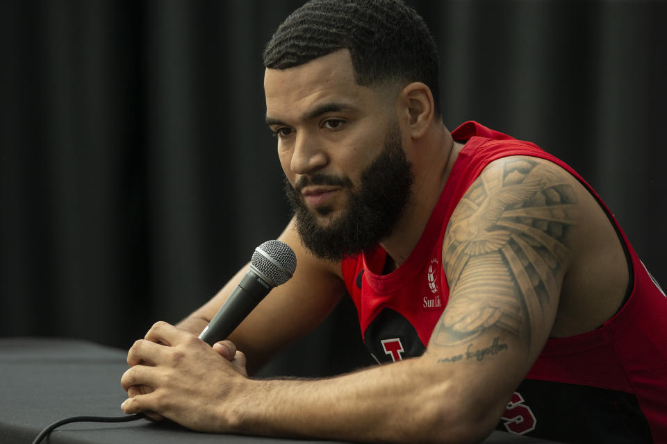 Toronto Raptors' Fred VanVleet speaks to reporters at the NBA basketball team's media day availability, in Toronto, Monday, Sept. 26, 2022. (Chris Young/The Canadian Press via AP)